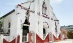 14일 아이티에서 발생한 강진으로 심각한 손상을 입은 교회 건물